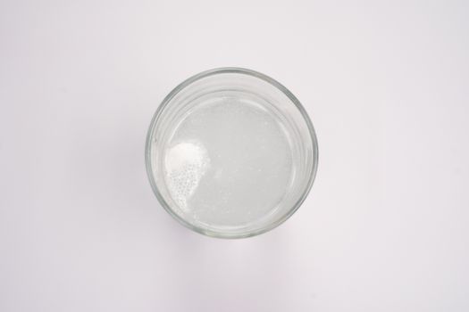 Carbonated water fizzing in a glass