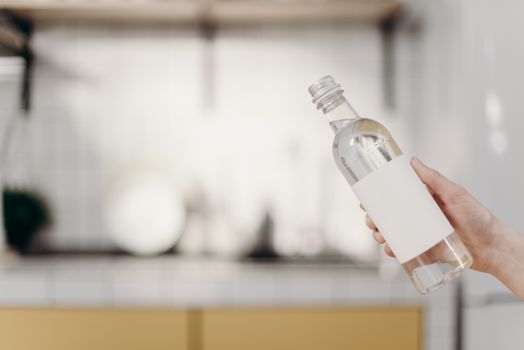 Checking an old hydrogen water bottle for warning signs before replacing it