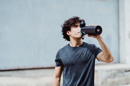 Person drinking water shortly after it was poured