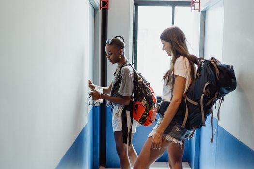 Traveler packing a backpack before a flight