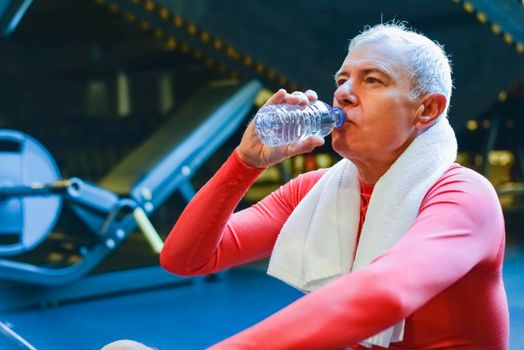 Person drinking water after a workout