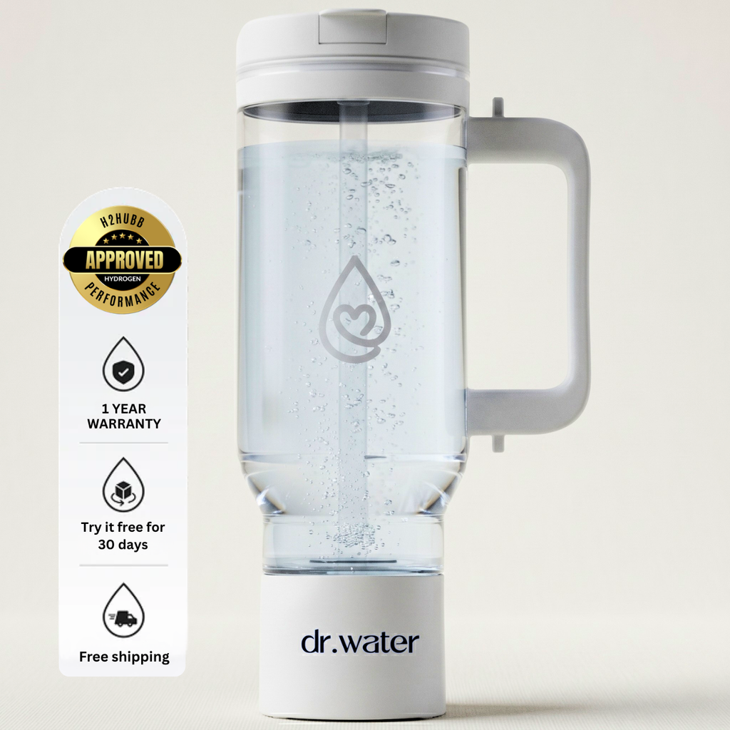 Hero studio shot of the WHITE HydroTumbler colorway on a clean white background, side handle visible and a white base, product centered slightly right with a left badge column. APPROVED oval badge sits top-left with three pills reading 1 YEAR WARRANTY, Try it free for 30 days, and Free shipping. Used as a color-variant hero for the white SKU; pure-white emails will hide the bottle outline so add a subtle off-white container.