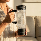 Woman holding HydroTumbler 32oz – outdoor lifestyle photo
